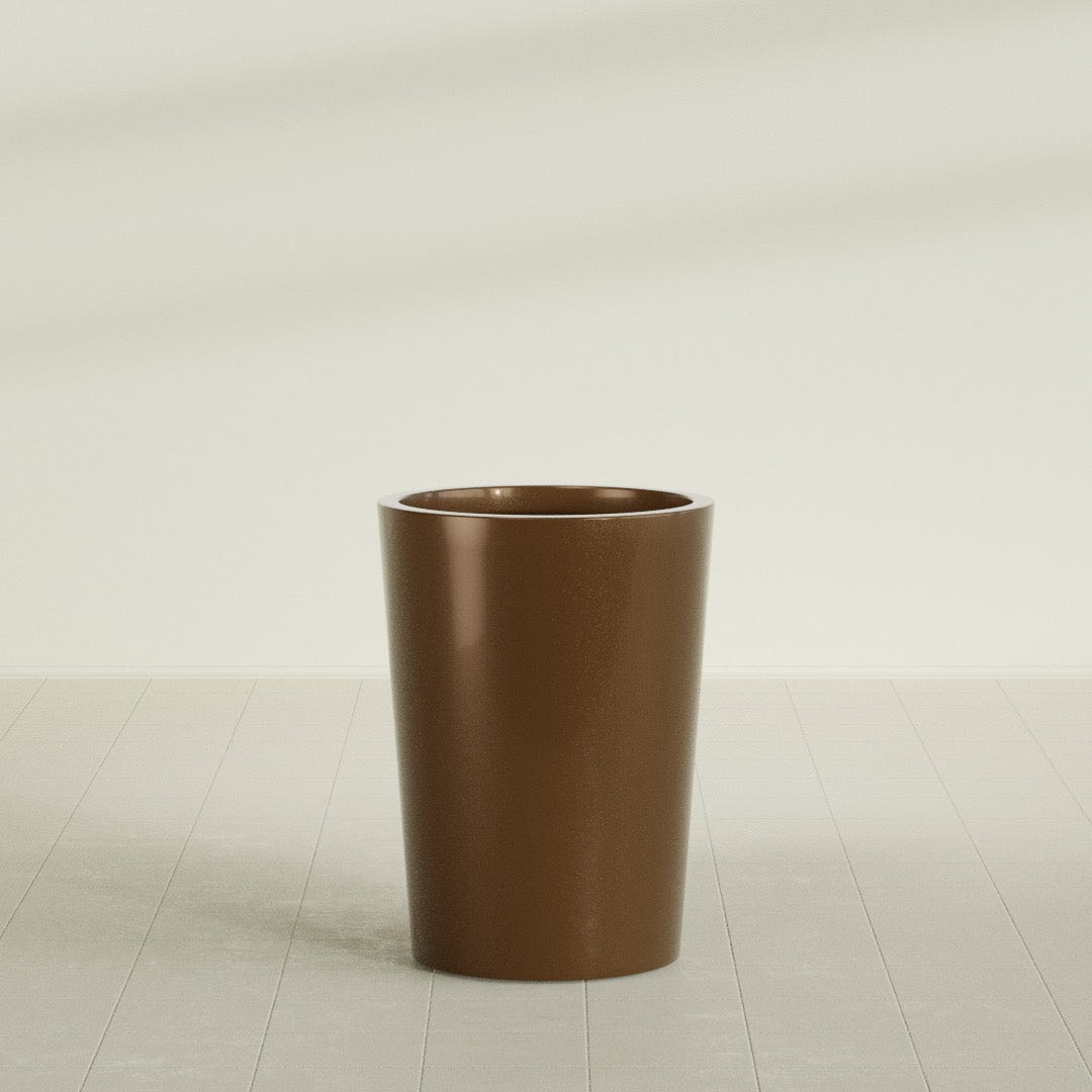 Tegel Round Tapered Planter in Metallic Bronze, 22"D × 30"H, shown empty