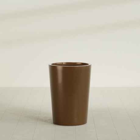 Tegel Round Tapered Planter in Metallic Bronze, 22"D × 30"H, shown empty