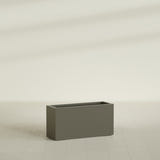 Hollywood Narrow Rectangular Planter in Matte Bronze, 36"L × 12"D × 24"H, shown empty