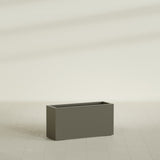 Hollywood Narrow Rectangular Planter in Matte Bronze, 36"L × 12"D × 24"H, shown empty