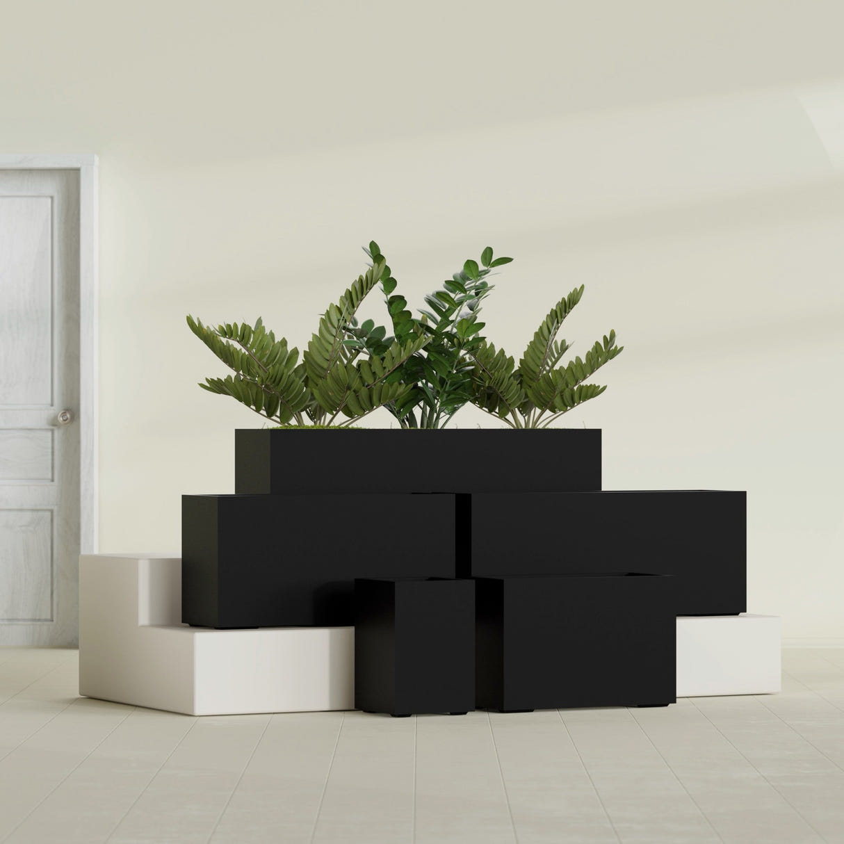 Tolga Rectangular fiberglass planter in Matte Black, size range, in a sunlit interior