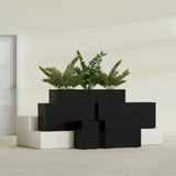 Tolga Rectangular fiberglass planter in Matte Black, size range, in a sunlit interior