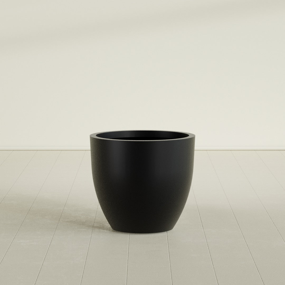 Wannsee Round Planter in Matte Black, 33"D × 29"H, shown empty