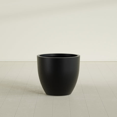 Wannsee Round Planter in Matte Black, 33"D × 29"H, shown empty