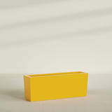 Panama Tapered Rectangular Planter in Gloss Saffron, 48"L × 12"D × 18"H, shown empty