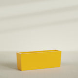 Panama Tapered Rectangular Planter in Gloss Saffron, 48"L × 12"D × 18"H, shown empty