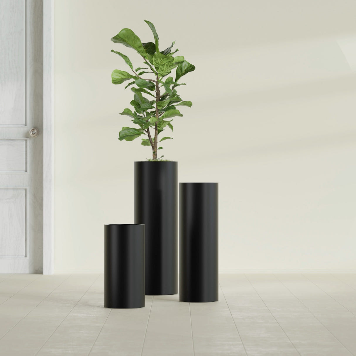 Corry Cylinder fiberglass planter in Matte Black, size range, in a sunlit interior
