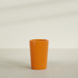 Tegel Round Tapered Planter in Gloss Tangerine, 18"D × 26"H, shown empty