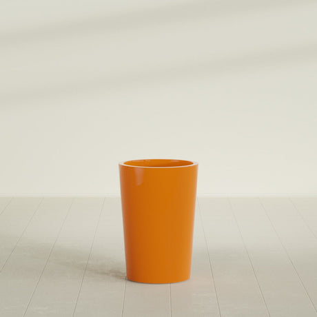 Tegel Round Tapered Planter in Gloss Tangerine, 18"D × 26"H, shown empty