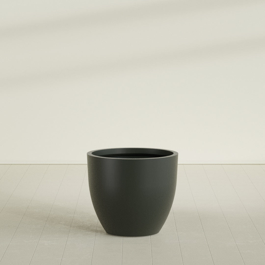 Wannsee Round Planter in Matte Charcoal, 39"D × 34"H, shown empty