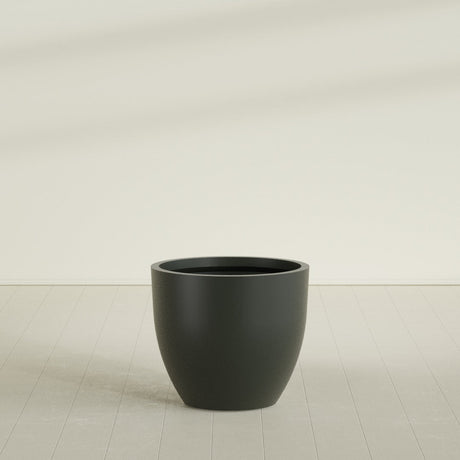 Wannsee Round Planter in Matte Charcoal, 39"D × 34"H, shown empty