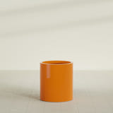 Rio Grande Cylinder Planter in Gloss Tangerine, 18"D × 20"H, shown empty