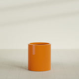 Rio Grande Cylinder Planter in Gloss Tangerine, 18"D × 20"H, shown empty