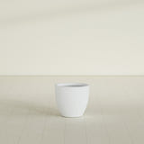Wannsee Round Planter in Gloss Bright White, 22"D × 19"H, shown empty