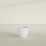 Wannsee Round Planter in Gloss Bright White, 22"D × 19"H, shown empty