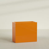 Darwin Rectangular Planter in Gloss Tangerine, 48"L × 24"D × 42"H, shown empty