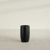 Lisbon tall round tapered fiberglass planter in Matte Black, 14 in diameter, 25 in high, shown empty