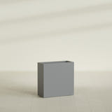 Milano Narrow Rectangular Planter in Matte Gunmetal, 24"L × 10"D × 24"H, shown empty
