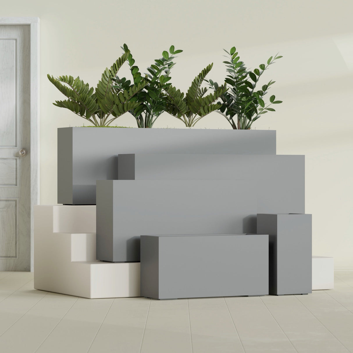 Hollywood Narrow Rectangular fiberglass planter in Matte Gunmetal, size range, in a sunlit interior