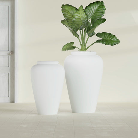 Barà Jar fiberglass planter in Matte Bright White, size range, in a sunlit interior