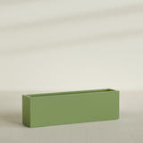 Miami Narrow Rectangular Planter in Satin Green, 60"L × 12"D × 18"H, shown empty