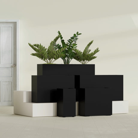 Potsdam Corner fiberglass planter in Matte Black, size range, in a sunlit interior