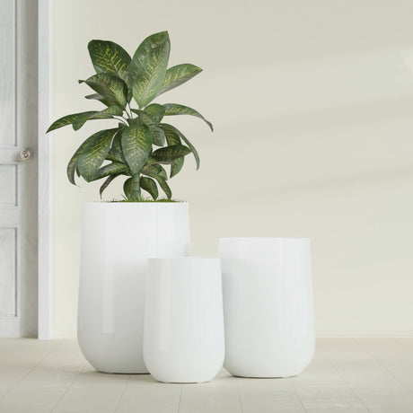 Hayden Urn fiberglass planter in Gloss Bright White, size range, in a sunlit interior