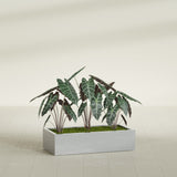 Antwerp Rectangular fiberglass planter in Metallic Silver, shown planted, in a sunlit interior