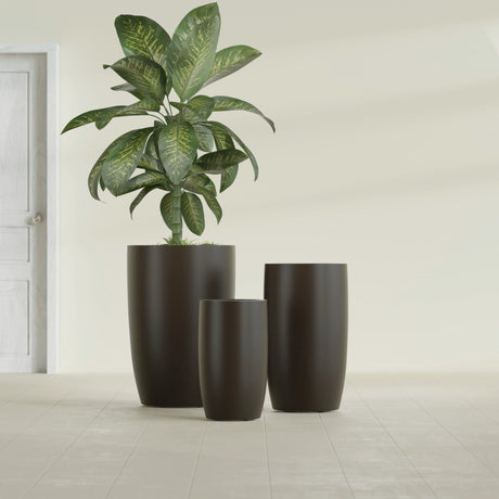 Lisbon Tall Round fiberglass planter in Matte Dark Brown, size range, in a sunlit interior