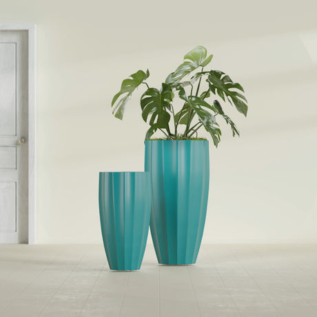 San Jose Tall Fluted fiberglass planter in Satin Seafoam Green, size range, in a sunlit interior
