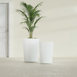 Tegel Round Tapered fiberglass planter in Gloss Bright White, size range, in a sunlit interior
