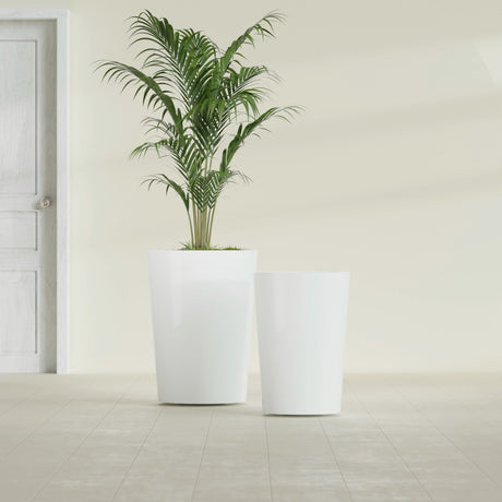 Tegel Round Tapered fiberglass planter in Gloss Bright White, size range, in a sunlit interior