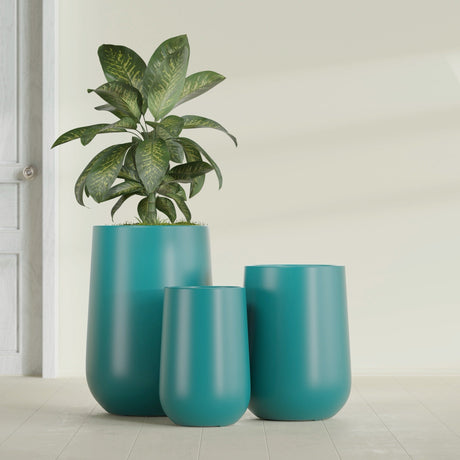 Hayden Urn fiberglass planter in Satin Seafoam Green, size range, in a sunlit interior