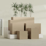 Brisbane Corner fiberglass planter in Gloss Metallic Gold, size range, in a sunlit interior