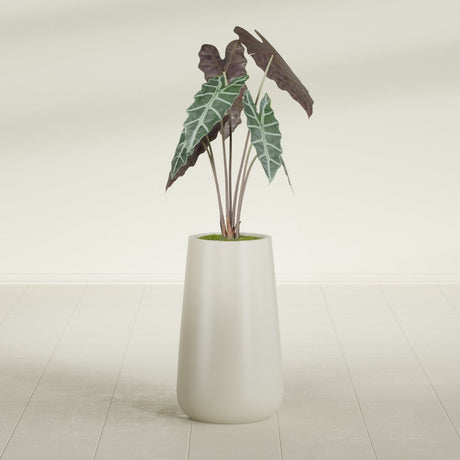 Saigon Tapered Round fiberglass planter in Satin Beige, shown planted, in a sunlit interior