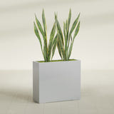 Perth Rectangular fiberglass planter in Metallic Silver, shown planted, in a sunlit interior