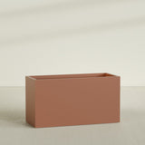 Brisbane Rectangular Planter in Matte Terra Cotta, 60"L × 24"D × 32"H, shown empty