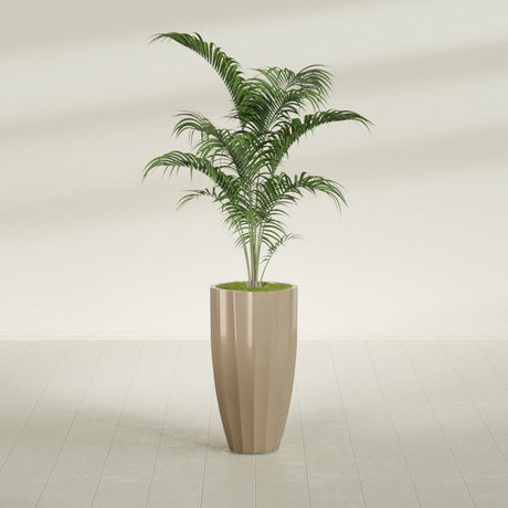 San Jose Tall Fluted fiberglass planter in Gloss Metallic Gold, shown planted, in a sunlit interior
