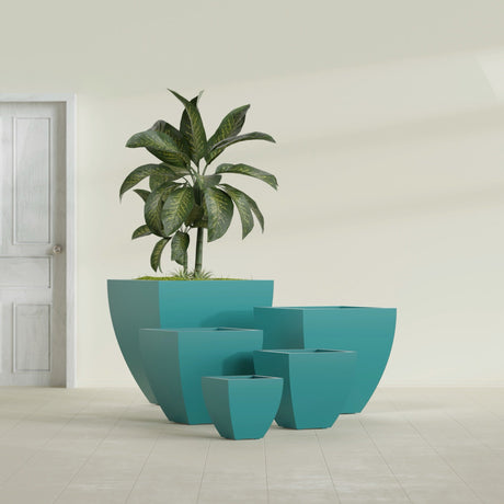 Lima Tapered Square fiberglass planter in Satin Seafoam Green, size range, in a sunlit interior