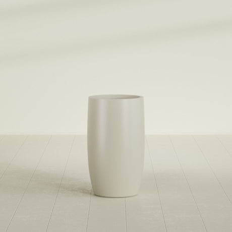 Lisbon tall round tapered fiberglass planter in Satin Beige, 18 in diameter, 32 in high, shown empty