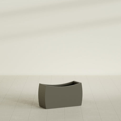 Seoul Curved Planter in Matte Bronze, 32"L × 12"D × 18"H, shown empty