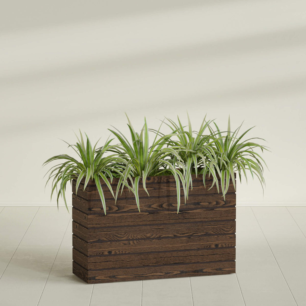 Sedona wood-look tall rectangular fiberglass planter in a sunlit interior, planted