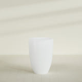 Brannan Tapered Round Planter in Matte Bright White, 30"D × 41"H, shown empty