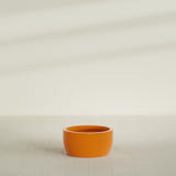 Casablanca Bowl Planter in Gloss Tangerine, 24"D × 12"H, shown empty