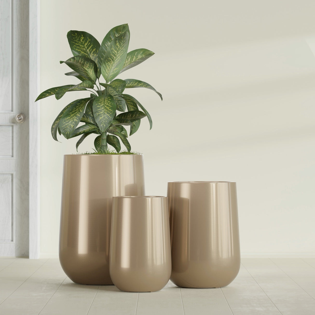 Hayden Urn fiberglass planter in Gloss Metallic Gold, size range, in a sunlit interior