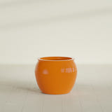 Shanghai Fishbowl Planter in Gloss Tangerine, 22", shown empty