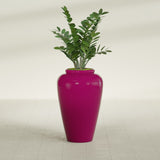 Barà Jar fiberglass planter in Gloss Eggplant, shown planted, in a sunlit interior