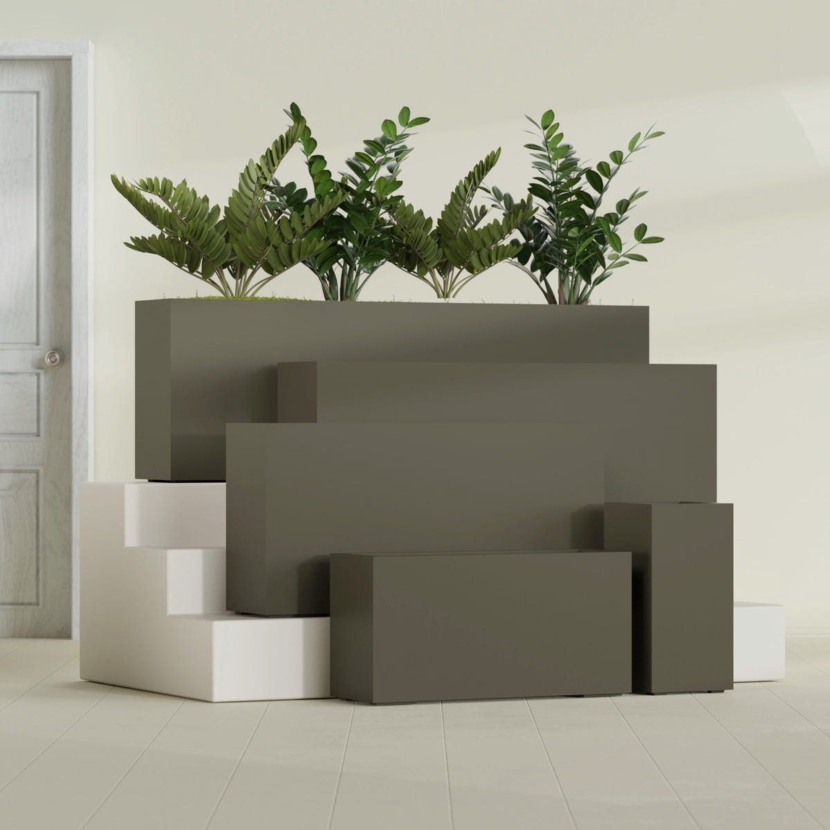 Hollywood Narrow Rectangular fiberglass planter in Matte Bronze, size range, in a sunlit interior