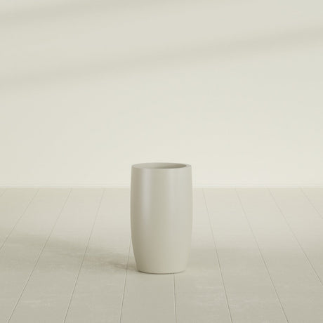 Lisbon tall round tapered fiberglass planter in Satin Beige, 14 in diameter, 25 in high, shown empty