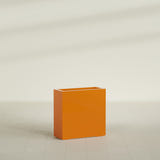 Milano Narrow Rectangular Planter in Gloss Tangerine, 24"L × 10"D × 24"H, shown empty